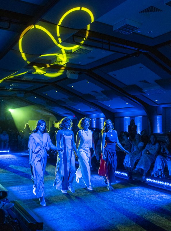 Sugar and Thread models show their diverse fashions. Shown are (l-r) Buehler sisters Milena, Reagan and Dru with mom Alyssa Titus.